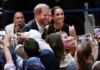 Harry and Meghan’s Australia Trip Draws Crowds, Royals Unfazed