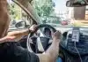 Touching Your Phone in a Car Mount: UK Lawyer Explains the Law