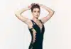 Gigi Hadid Recreates Iconic Versace Safety Pin Dress Moment
