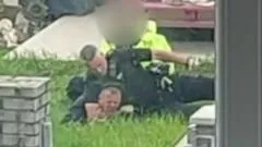 PC Denies Misconduct in Arrest Involving Headlock and Punches